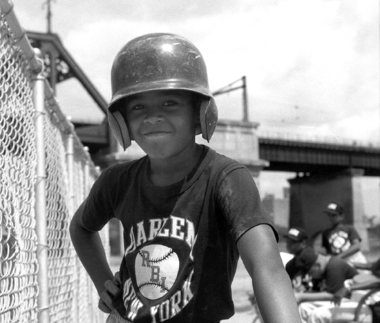 Image of  Harlem RBI player poses on Randall&acute;s Island, August 5, 1993.  Image: Simon Benepe.  Neg. M104_61025